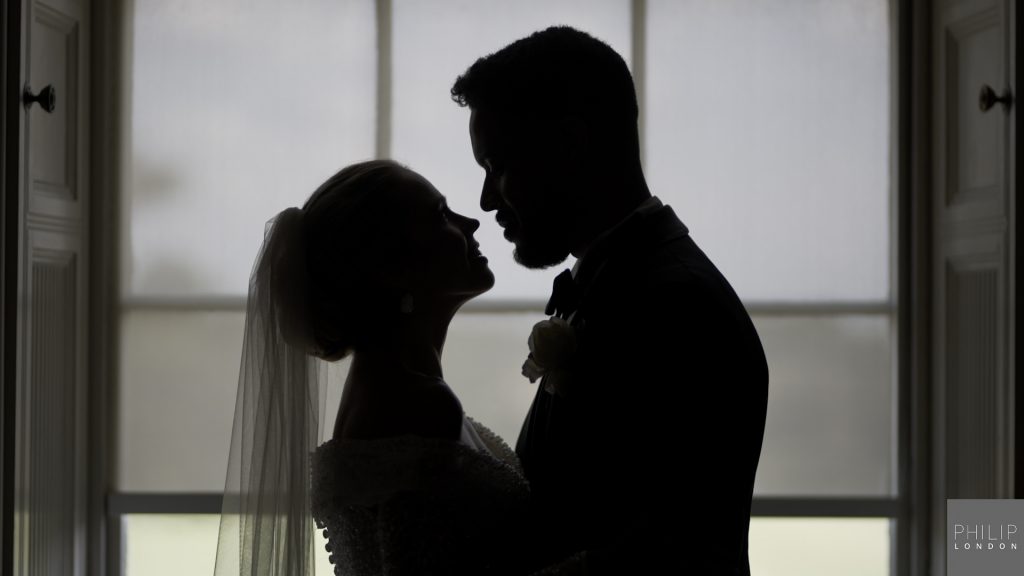 Silhouette of couple on their wedding day.